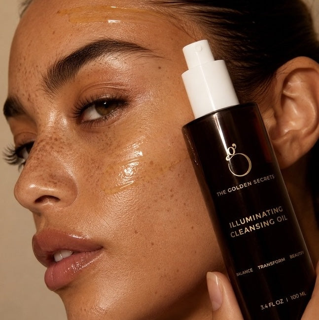girls face with illuminating cleansing oil