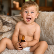 baby with happy baby oil