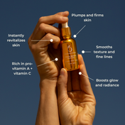 A person holds a small amber serum bottle labeled THE GOLDEN SECRETS Five-Minute Facelift Kit, with text highlighting benefits: plumps and firms, revitalizes, smooths texture, boosts glow for radiant skin, and is rich in pro-vitamin A and vitamin C—an essential part of your facial ritual.