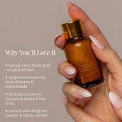 A hand with manicured nails holds a brown bottle with a gold cap from THE GOLDEN SECRETS Cleansing Duo. Text beside it highlights its benefits: gently resurfaces, minimizes pores and blackheads, smooths texture, and leaves skin visibly brighter, clearer, and more luminous for a radiant complexion.