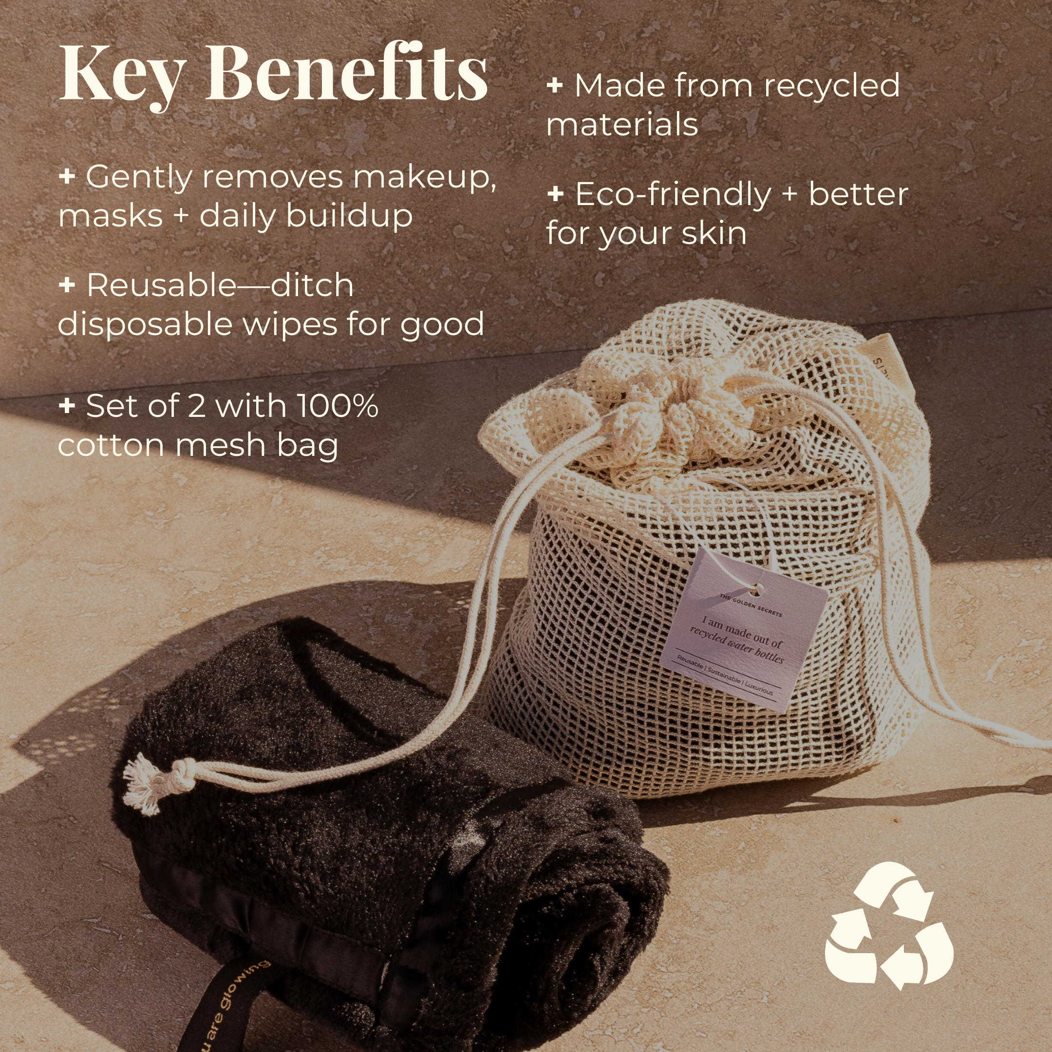 The Clear Confident Skin Kit from THE GOLDEN SECRETS features two reusable facial pads—one black and one beige—resting on a stone surface alongside a cotton mesh bag. Text highlights benefits such as eco-friendliness, use of recycled materials, and the kit’s ability to replace disposable wipes for clearer skin. A recycling icon is also displayed.