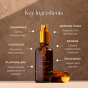 A brown bottle of THE GOLDEN SECRETS Mom & Baby Oil with a gold cap is centered. Text highlights key ingredients and benefits—chamomile, meadowfoam, calendula, baobab, plantain leaf, and chickweed—set against a beige background. Specially crafted to protect baby’s delicate skin barrier and support mom’s changing skin, this nourishing duo offers gentle care for your family’s needs.