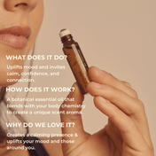 A person holds a Signature Blend Essential Oil roller bottle from THE GOLDEN SECRETS near their nose. Text highlights how this organic oil harmonizes with your body chemistry to uplift your mood and create a soothing, elevated atmosphere for you and those around you through botanical aromatherapy.