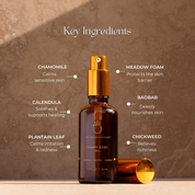 Brown glass bottle with gold cap labeled 'Happy Baby Oil' on a brown background with text about key ingredients.
