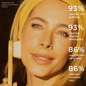 A smiling woman with a yellow headband brushes her cheek with the Celestial Sweep Facial Brush from THE GOLDEN SECRETS, revealing her radiant complexion. Overlaid text: 93% reported less puffiness, 93% brighter-looking skin, 86% less congestion, 86% smoother skin. Survey of 25 customers.